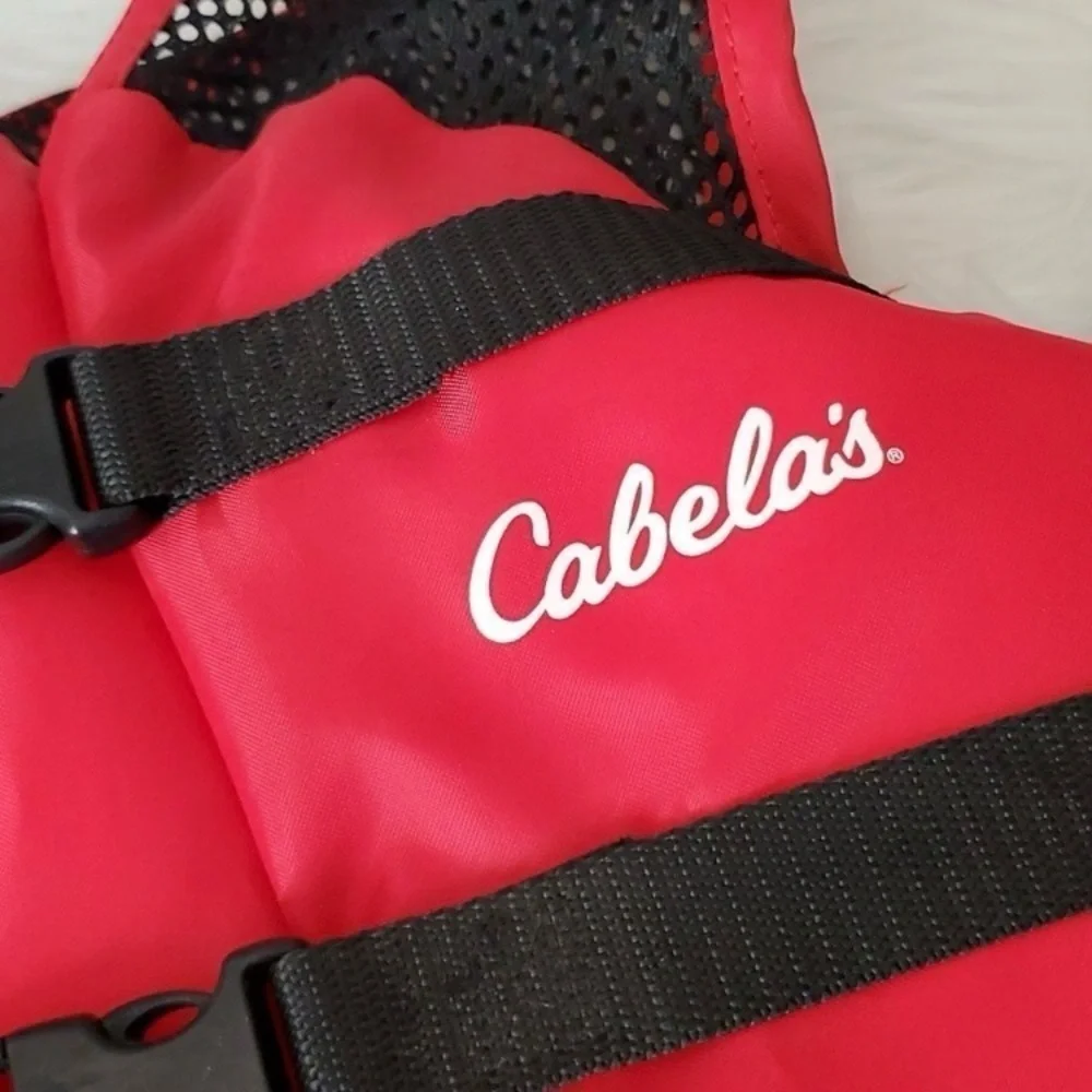 The Cabela's Youth Red General Boating Life Vest, fits 50-90 LBS